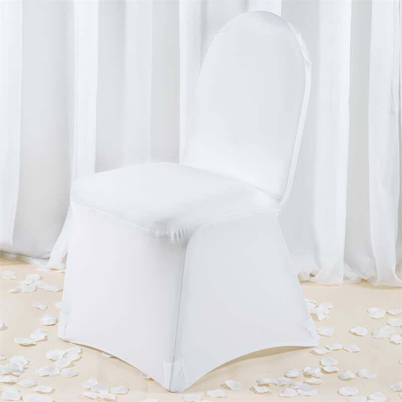 White chair cover on a plain backdrop with scattered petals.