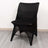 Black mesh chair on a plain background