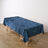 Navy blue velvet tablecloth draped over a wooden table