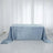 Light blue tablecloth on a table in a bright, airy setting.