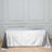 Silver tablecloth draped over a table in a studio setting.