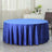 Blue round tablecloth draped elegantly over a table in a styled room.