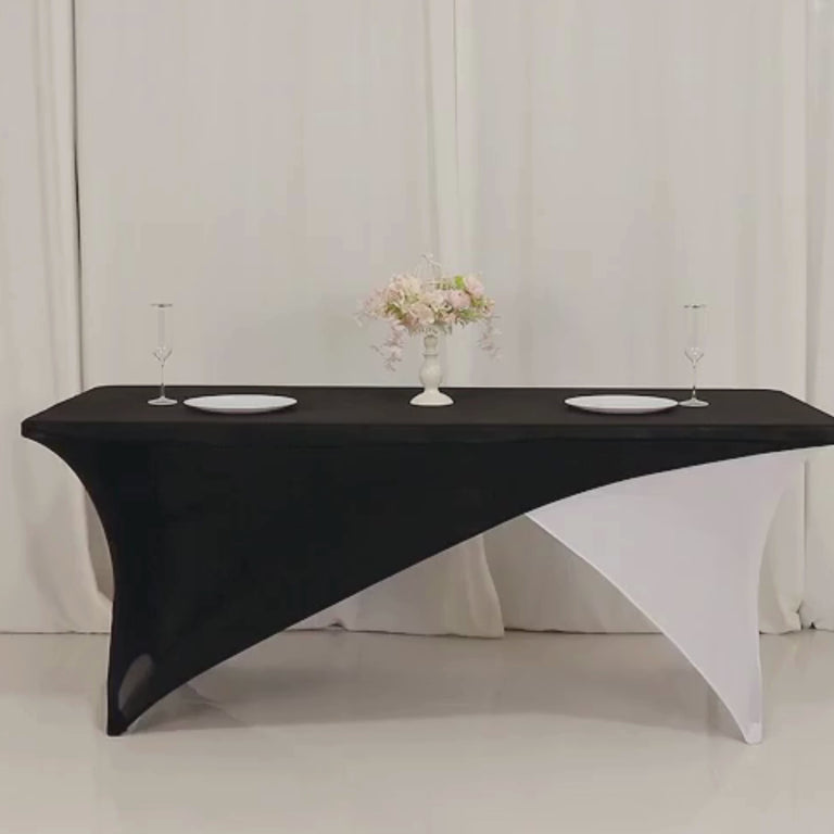 Black and white stretch spandex table cover with elastic foot pockets.