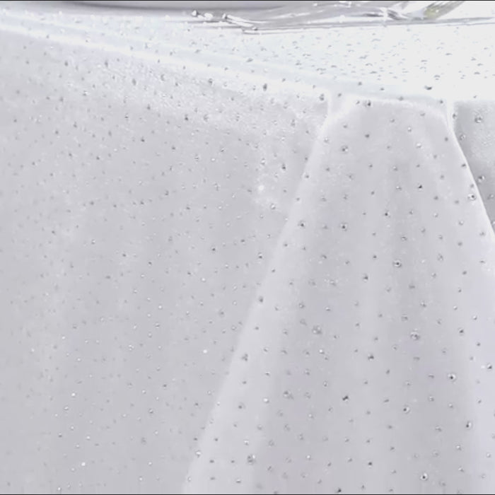 White tablecloth with rhinestone accents, wrinkle-free and stain-resistant.