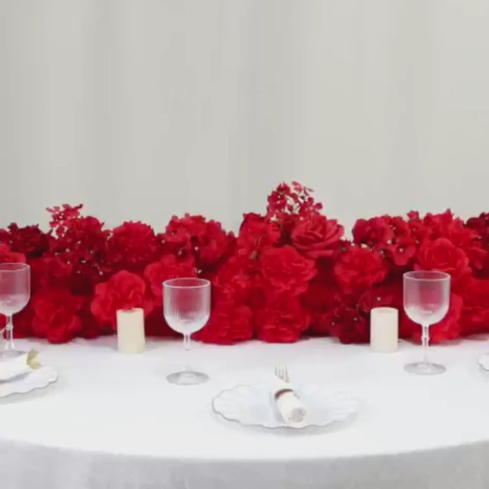 Mixed red silk flower runner for wedding table decor.