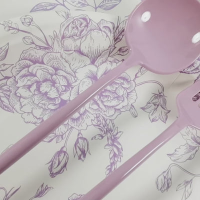 Lavender lilac heavy-duty plastic utensils on floral background.
