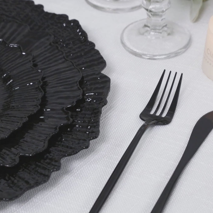Black dessert and appetizer plates for elegant party tableware.