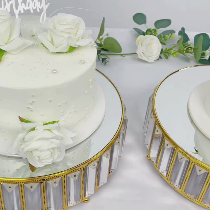 Gold crystal pendant cake stands with mirror tops, perfect for elegant dessert displays.
