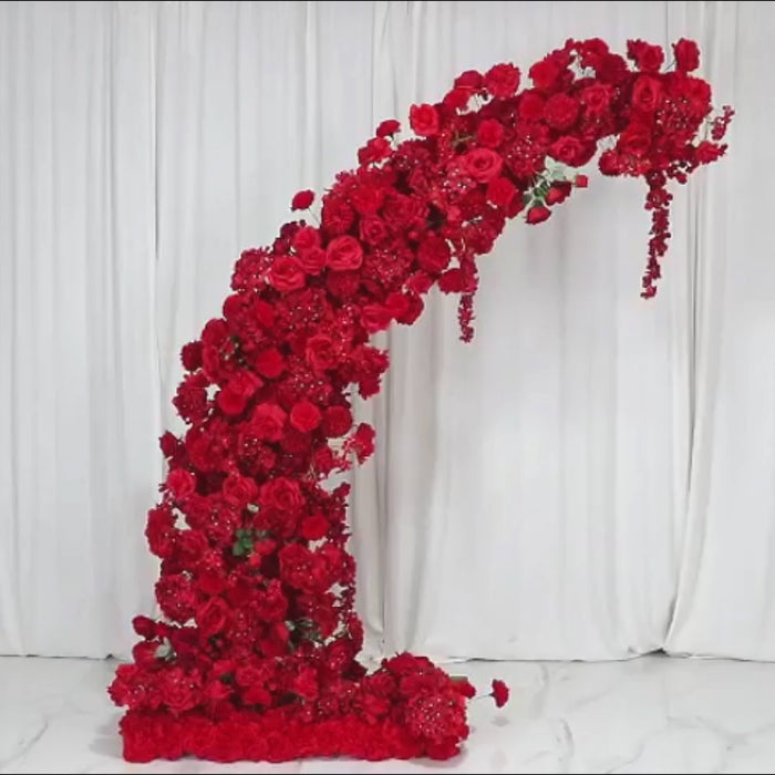 Red floral backdrop for 8ft half crescent wedding arch with roses and hydrangeas.