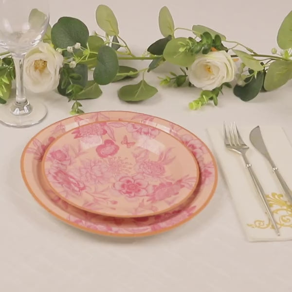 Dusty rose floral print disposable plates with gold rim for elegant dining.