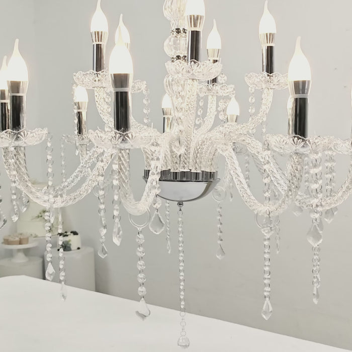 Silver crystal chandelier with 10 LED candle bulbs and decorative crystals.