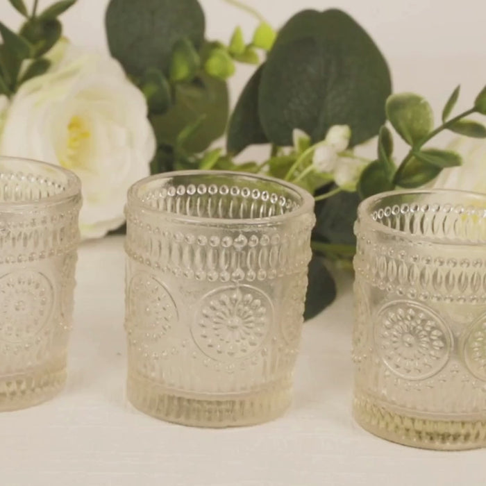 Clear glass votive candle holders with primrose design, set of 6.