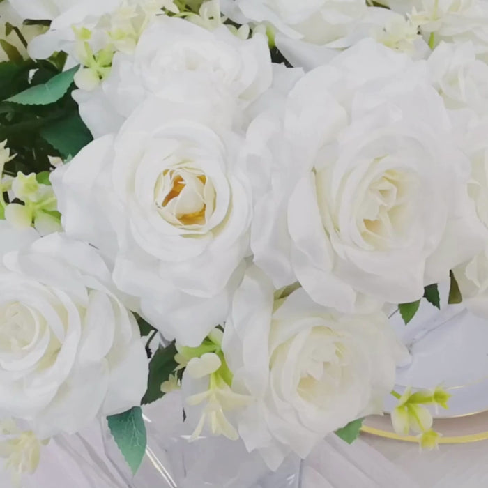 White silk rose flower arrangements in a long stem bouquet.