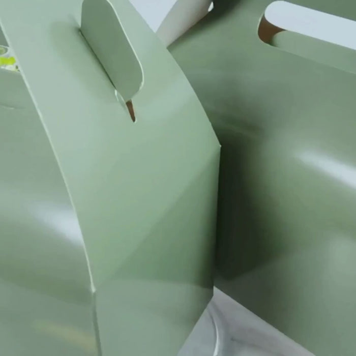 Dusty sage green party favor gable boxes in a 25 pack.
