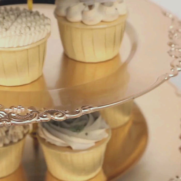 Metallic gold 3-tier cupcake stand with decorated cupcakes.