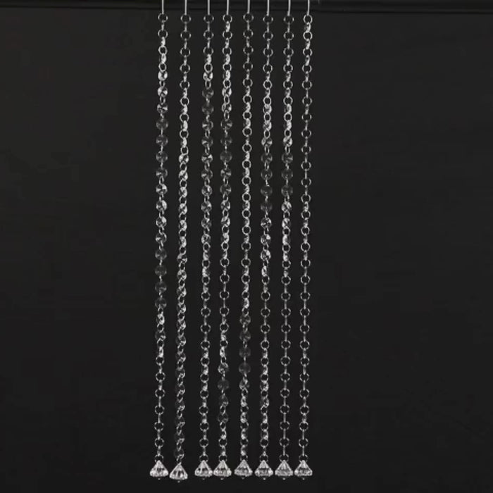 Clear octagon acrylic crystal beaded garland strands on a black background.