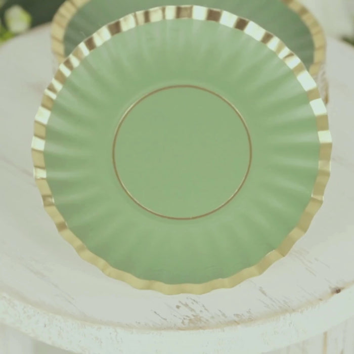 Dusty sage green mini dessert plates with gold scalloped rims.