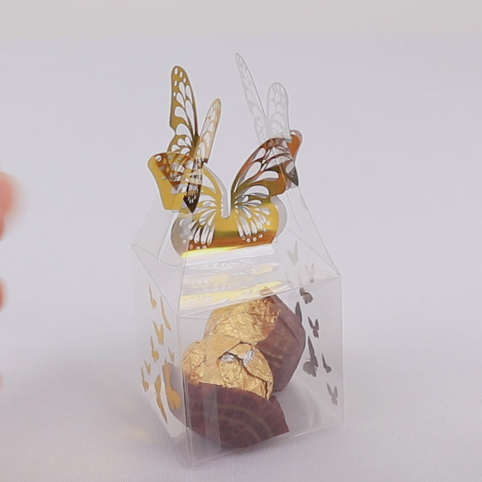 Clear plastic square candy gift box with gold butterfly top.