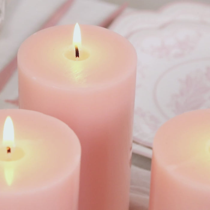 Blush unscented pillar candles for weddings and home decor.
