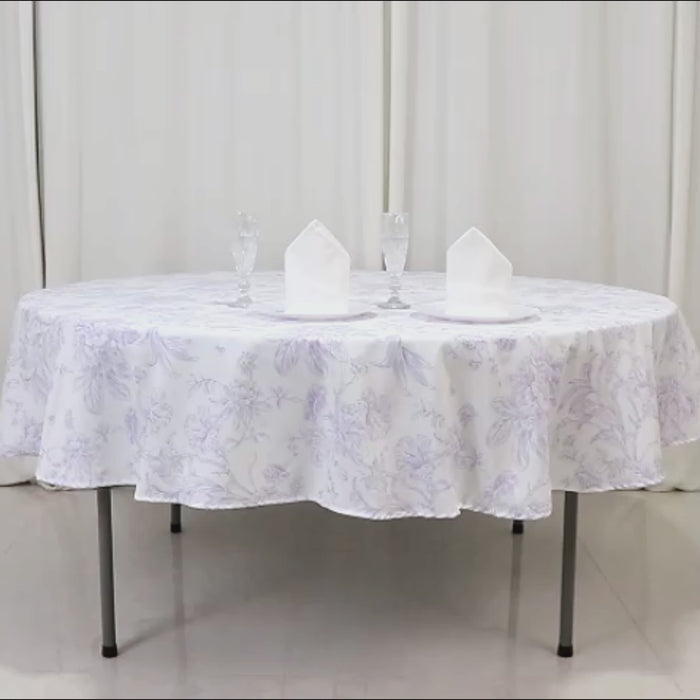 White tablecloth with dusty sage green French toile pattern for chic events.