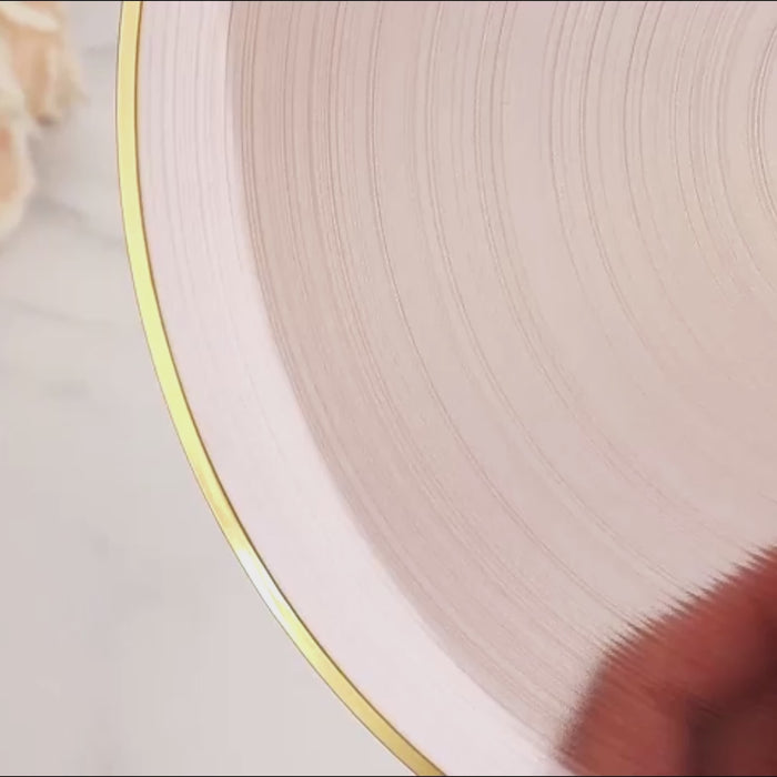 Dusty rose swirl plate with gold rim for elegant parties.