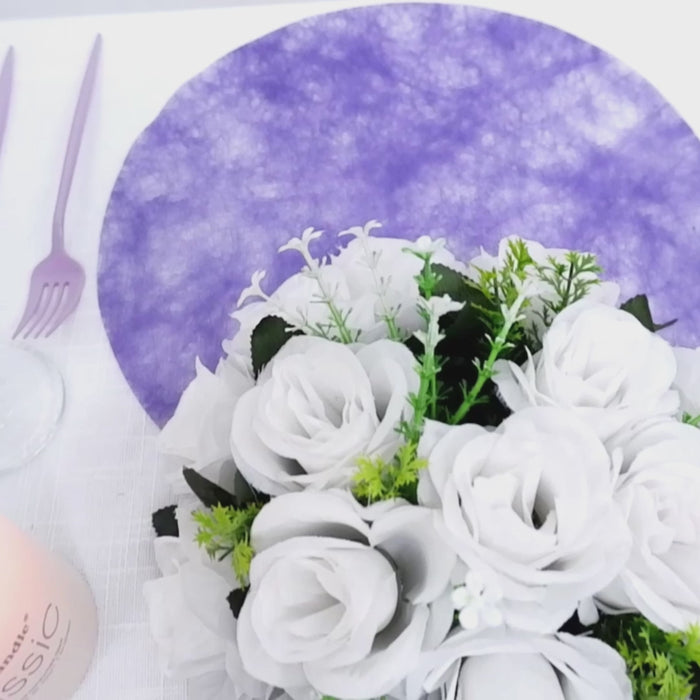 Lavender lilac disposable placemat with white floral arrangement.