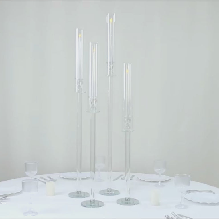 Clear crystal glass hurricane candle holders, decorative tall stands.