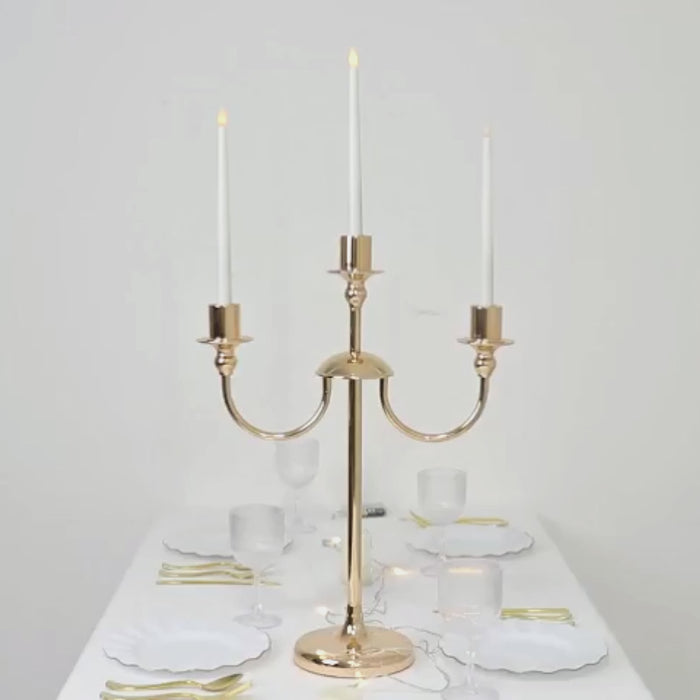 Gold 3-arm metal candelabra for modern table centerpiece.