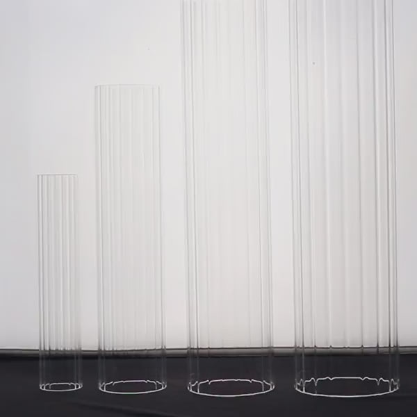 Clear ribbed glass candelabra shades for stylish table decor.
