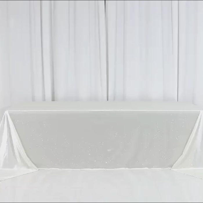 Pearl white rectangular tablecloth with rhinestone accents, wrinkle-free and stain-resistant.