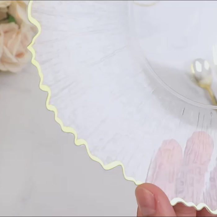 Clear plastic plate with a gold rim, perfect for desserts and appetizers.
