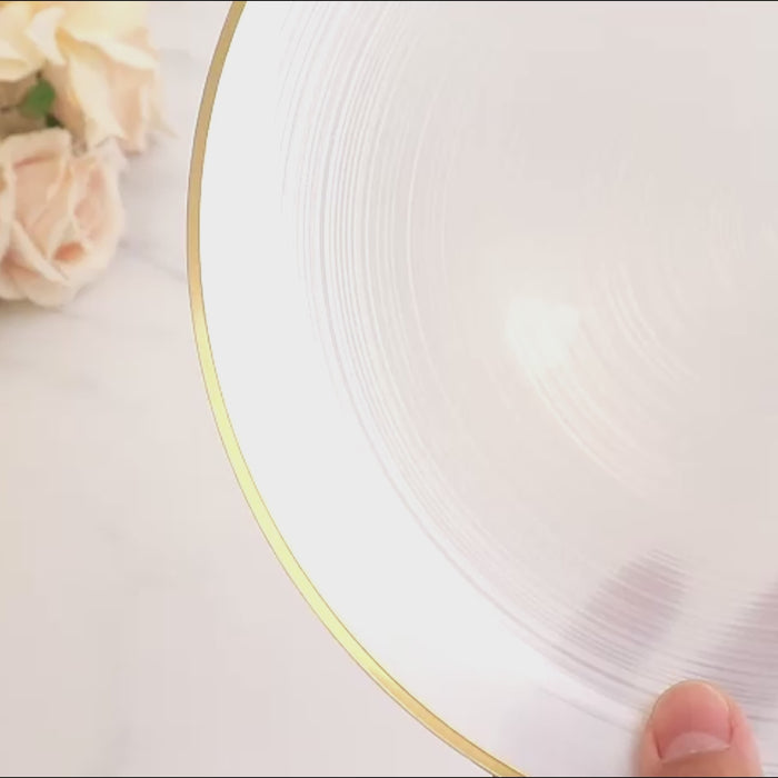 Transparent pearl white swirl plate with gold rim. Elegant dinnerware for parties.