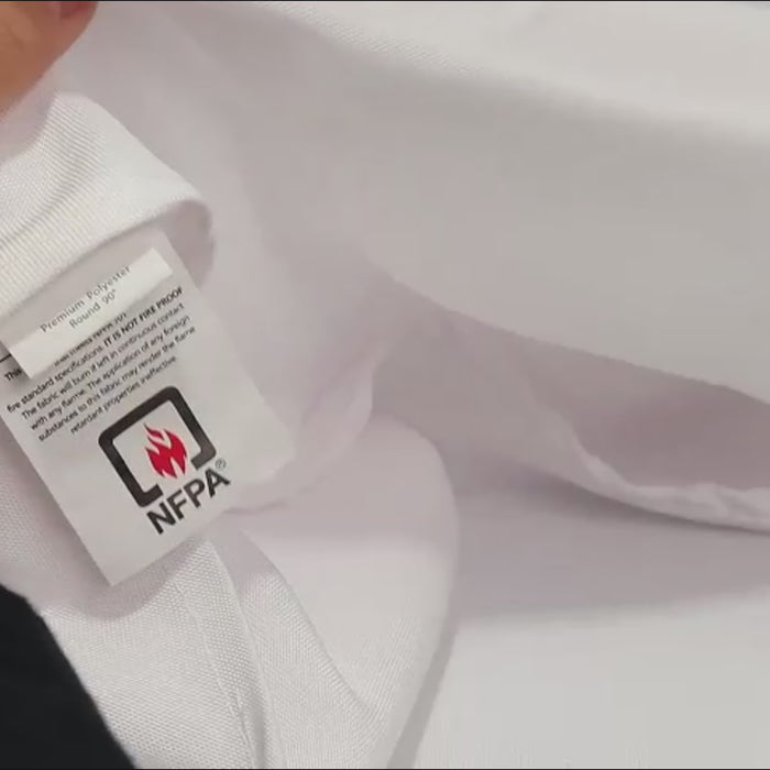 White fire retardant tablecloth with safety certification.