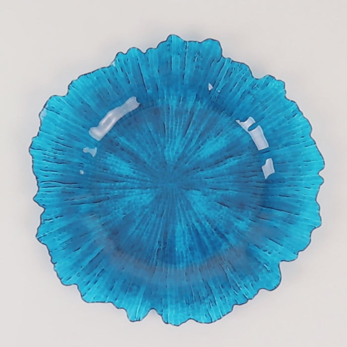 Transparent blue reef design charger plate, 13 inches round.
