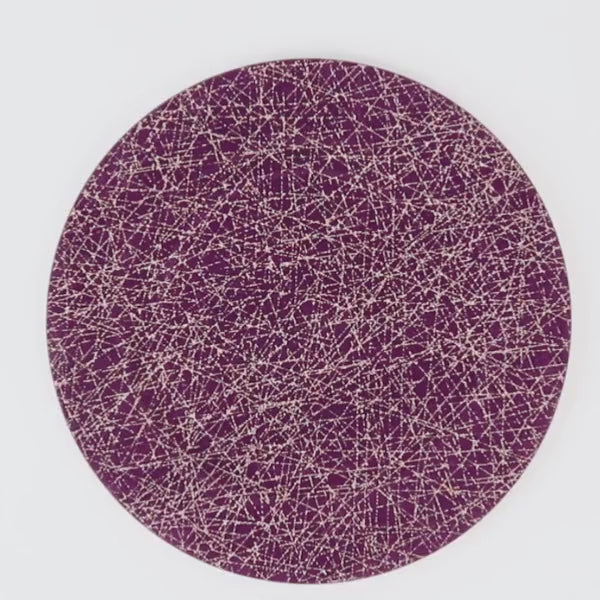 Purple charger plate with glitter gold abstract lines pattern.