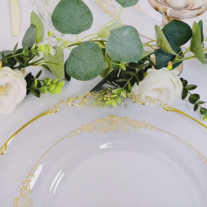 Clear acrylic charger plate with gold embossed baroque rim.
