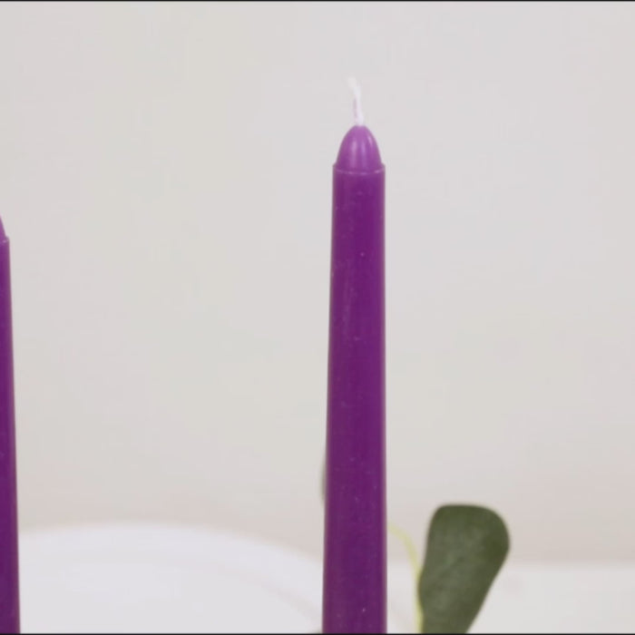 Purple taper candles, 10-inch, unscented, premium wax design.