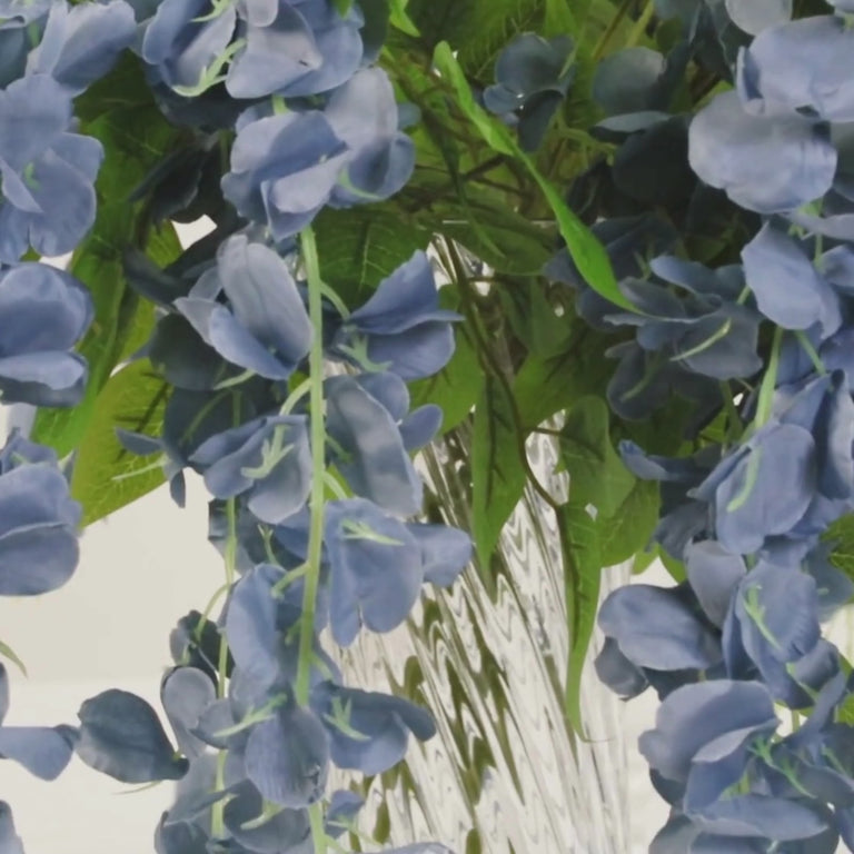 Dusty blue artificial silk wisteria flower garland vines in full strands.