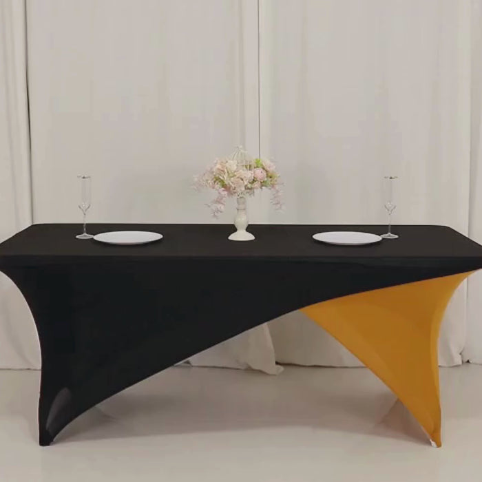 Black and gold stretch spandex fitted table cover on a rectangular table.