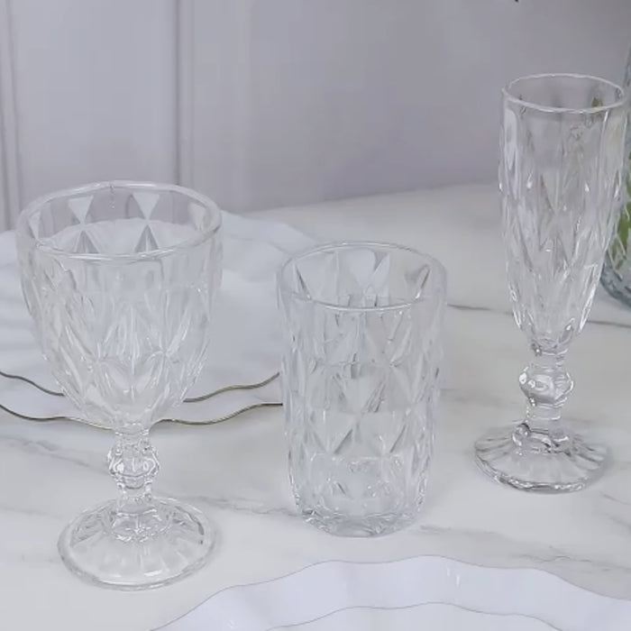 Clear crystal cut champagne flute glasses in a textured design.