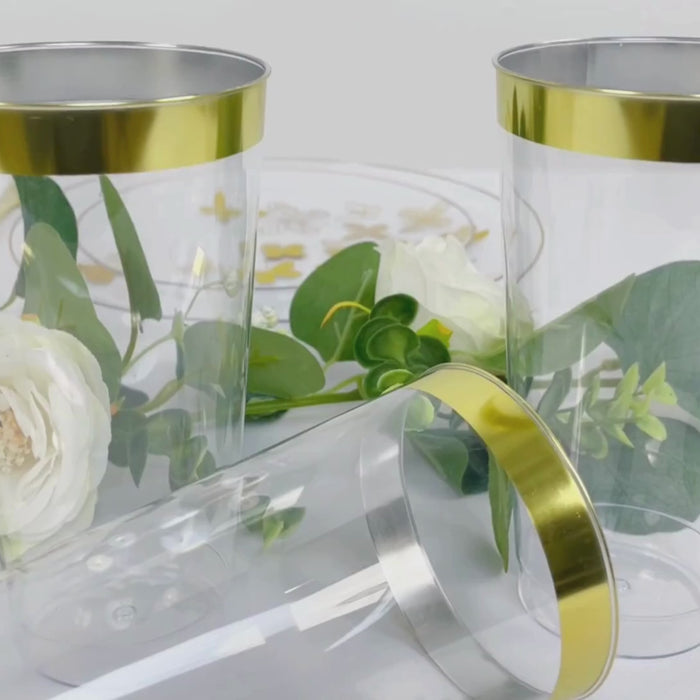 Clear plastic party cups with gold rim for drinks and decor.