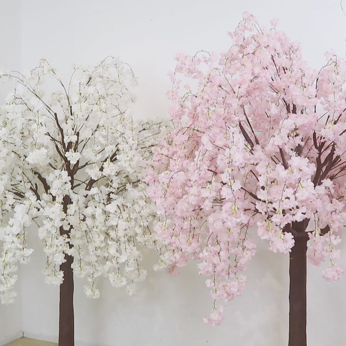 Blush artificial cherry blossom tree with a sturdy trunk and metal base.