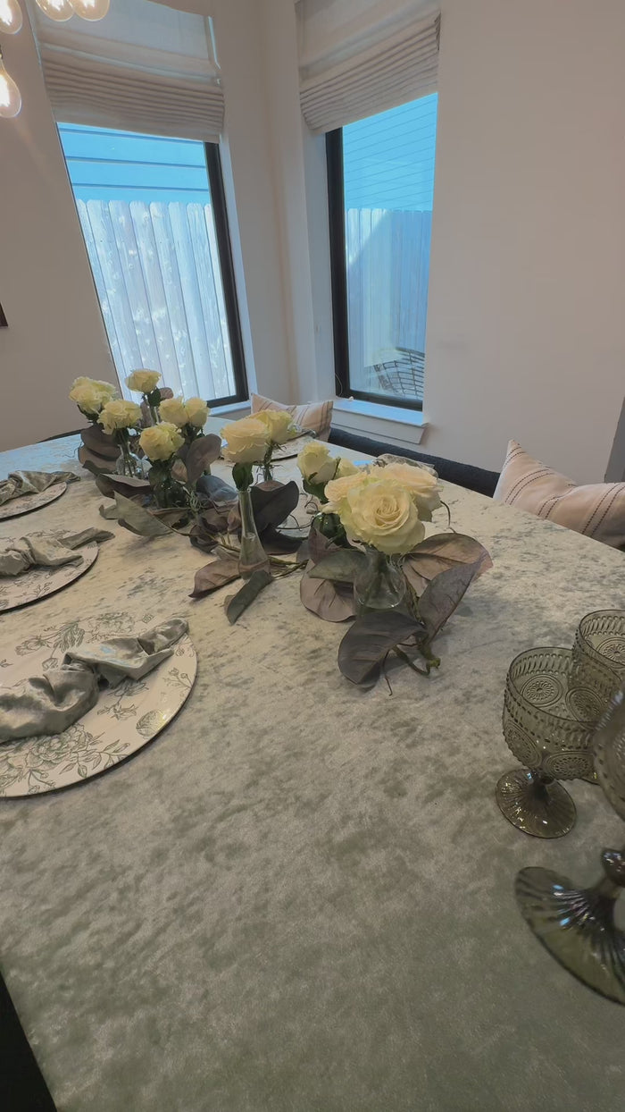 Dusty sage green vintage wine goblets on a beautifully set table.