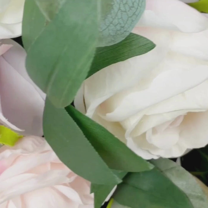 Cream blush floral swag with eucalyptus leaves, large artificial flower arrangement.