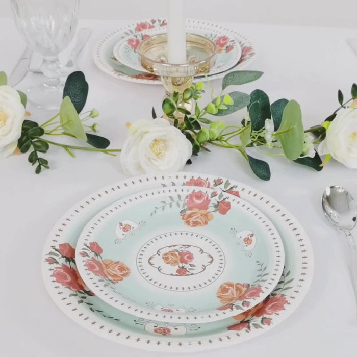 Light turquoise paper dinner plates with vintage rose flower print.