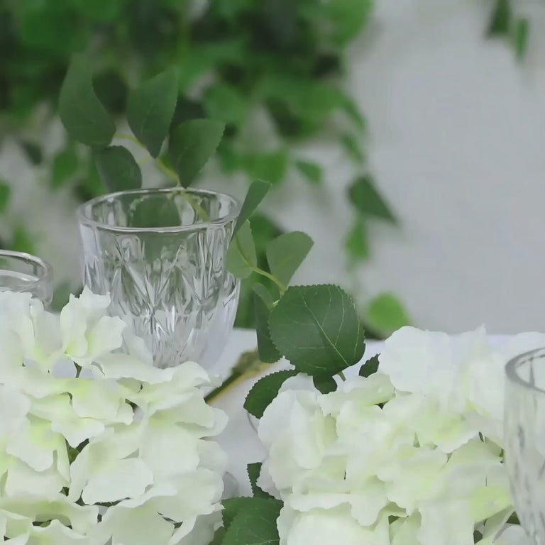 Ivory silk hydrangea garland with greenery, 5.5ft long.