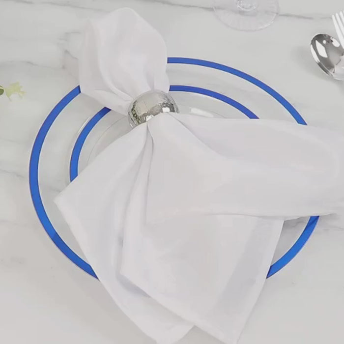 Clear plastic round dinner plate with blue rim, perfect for parties.