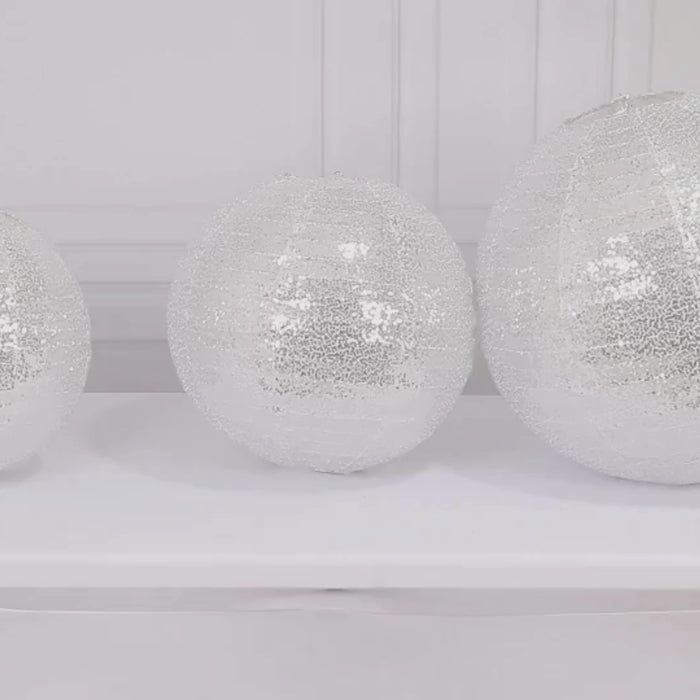 Shimmer silver sequin fabric hanging lanterns in three sizes.