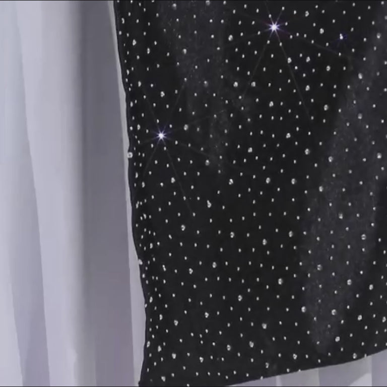 Black 20"x20" wrinkle-free reusable cloth napkin with rhinestone accents.
