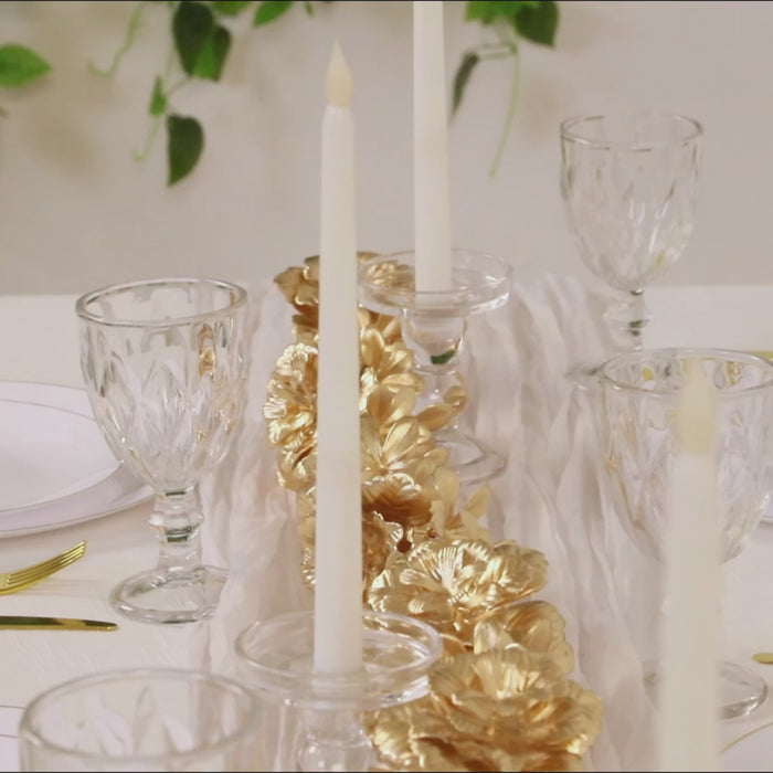 Metallic gold artificial flower garland for table and backdrop decor.